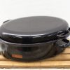 Sleek black casserole dish with lid, perfect for stylish cooking and serving homemade meals.