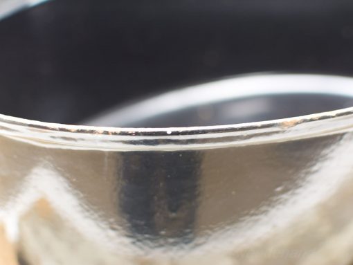 Elegant vintage metallic bowl with a shiny finish, perfect for serving and kitchen decor.