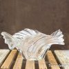 Elegant glass bowl with wave patterns, perfect for fruit or as a decorative accent.