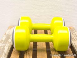 Bright yellow dumbbells for stylish home workouts and motivation. Durable, glossy, and functional.