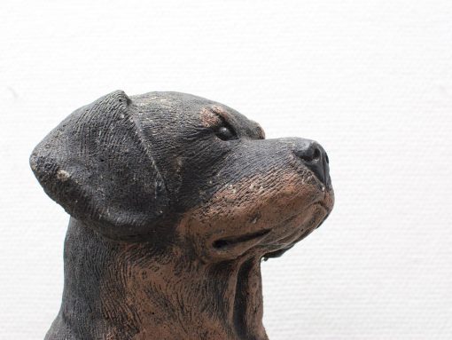 Detailed Rottweiler sculpture showcasing strength, loyalty, and realistic features. Perfect for dog lovers.