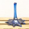 Vibrant blue glass droplet sculpture, perfect for modern decor and artistic collection.