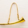 Elegant vintage brass horn with rope, perfect for music or as a decorative piece.