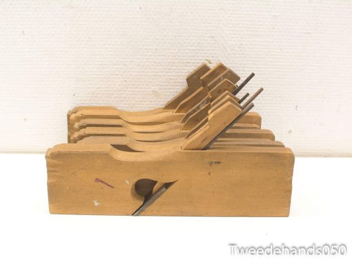 Vintage wooden hand planes showcasing craftsmanship for shaping and smoothing wood surfaces.
