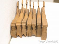 Vintage metal tool components showcasing craftsmanship and character, perfect for collectors and artisans.
