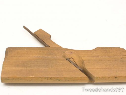 Vintage wooden plane, handcrafted tool showcasing exquisite craftsmanship and natural wood grain.