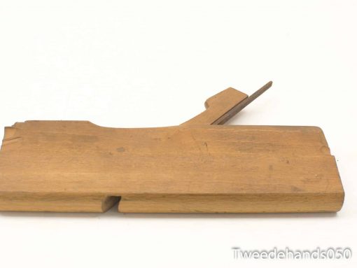 Vintage wooden hand plane for woodworking, showcasing craftsmanship and functionality in a classic design.