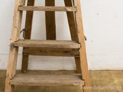 Vintage wooden ladder with natural finish, showcasing charm and functionality for everyday tasks.