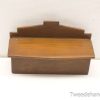 Elegant wooden storage box with vintage charm, perfect for organizing personal items.