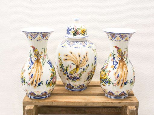 Colorful decorative porcelain vases featuring hand-painted floral and bird designs for stylish home decor.