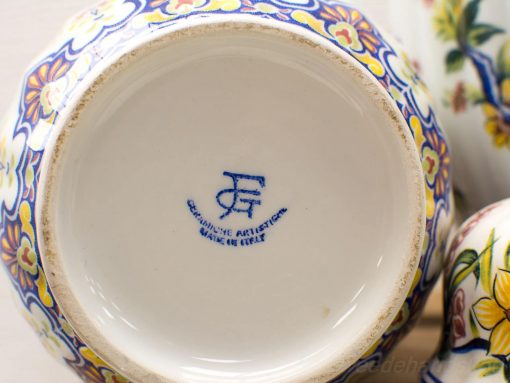 Elegant Italian ceramic bowl with vibrant floral design, perfect for decor and functionality.