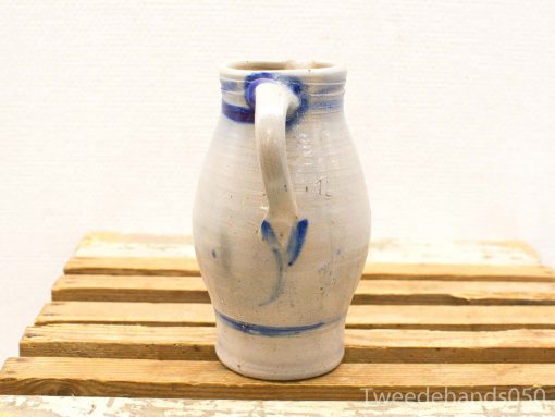 Charming ceramic jug with blue accents, perfect for vintage decor and practical use.