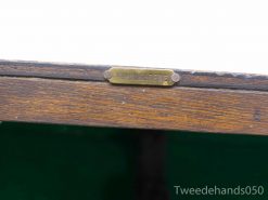 Antique wooden table with brass nameplate VAN GORSTEDE, showcasing vintage charm and craftsmanship.