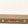 Vintage wooden storage box with leather handle and metal clasps, ideal for secure organization.