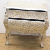 Elegant vintage chest of drawers with golden and white accents, beautifully crafted for stylish storage.