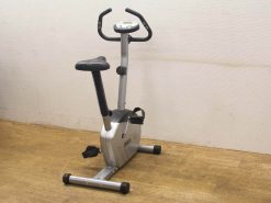 Sleek modern stationary bike for home workouts with adjustable seat and digital display.
