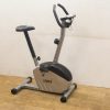 Sleek stationary exercise bike, perfect for indoor cardio workouts at home.