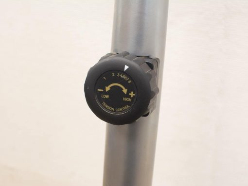 Adjustable tension control knob for industrial equipment with clear settings and ergonomic design.