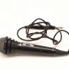 Used dynamic handheld microphone with coiled cable, perfect for live performances and recordings.