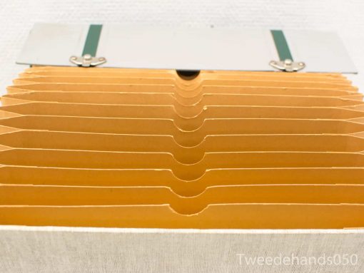 Stylish orange document organizer with compartments for efficient storage and easy access.