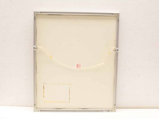 Back of a modern silver frame with beige backing and hanging string attachment.