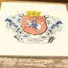 Decorative ceramic tile featuring Marburgs coat of arms with knight, crown, and vibrant colors.