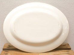 Elegant vintage white serving platter, perfect for special meals and gatherings.