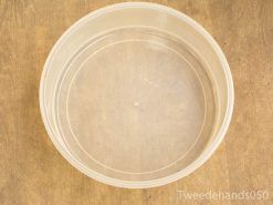 Versatile clear plastic container for serving, mixing, or storing food and ingredients.