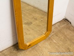 Elegant octagonal pine mirror, adding vintage charm and warmth to any space.