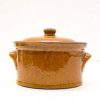 Charming brown ceramic pot with lid, perfect for cooking, serving, and rustic kitchen decor.