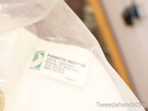 Clear bag with second-hand fenders by Perimeter Industries, showcasing quality and reliability.