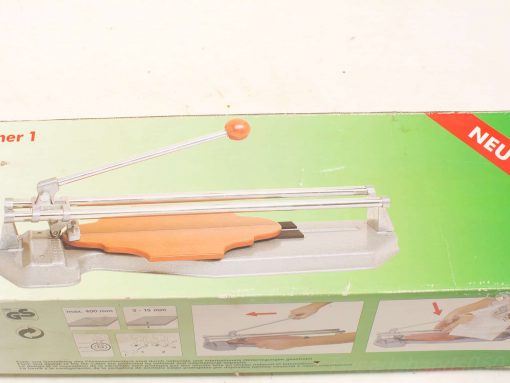 Sleek vintage cutting tool for crafting, featuring a sturdy base and sharp orange blade.