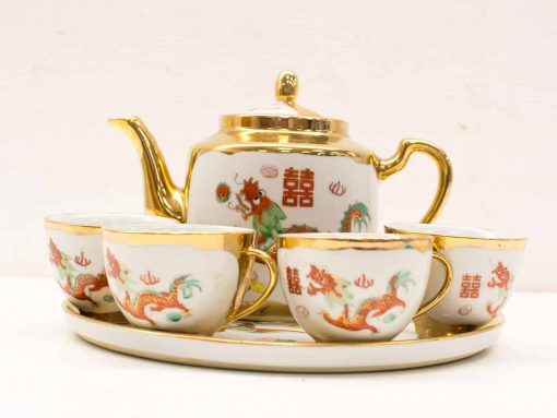 Elegant Chinese porcelain tea set with dragon motifs, perfect for special occasions and collectors.
