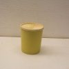 Vintage yellow storage container with decorative lid, perfect for kitchen or craft organization.
