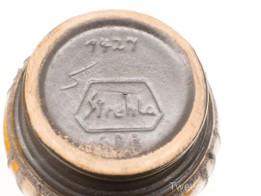 Vintage handcrafted Sincicla bottle with production code 7427, showcasing elegant, historical charm.