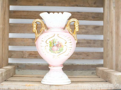 Elegant vintage vase with hand-painted scene and gold accents, perfect for art lovers.