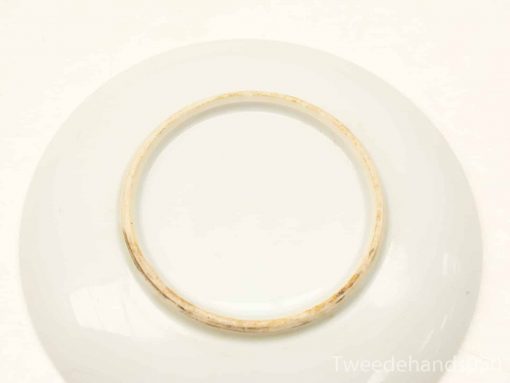Elegant white plate with rustic wooden ring, perfect for decoration or thoughtful gifting.