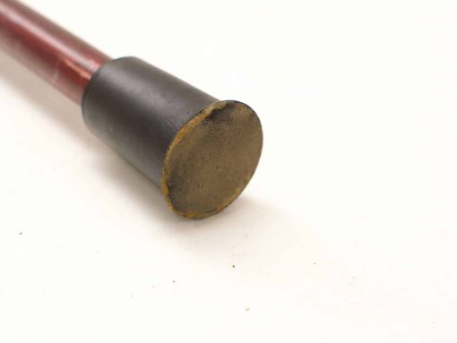 Elegant wooden cane with black rubber cap for style and durability. Perfect for daily support.