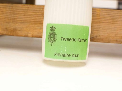 Vintage Tweede Kamer Plenary Hall sign with vibrant green background and official emblem.
