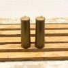 Antique brass candle holders for vintage decor, enhancing warmth and nostalgia in any space.