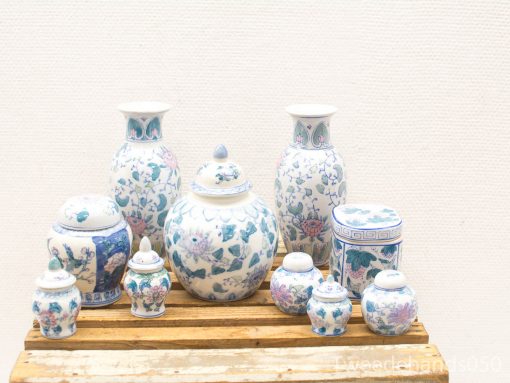 Elegant Chinese porcelain vases and jars featuring intricate floral designs for sophisticated decor.