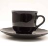 Stylish black ceramic coffee cup and saucer set for modern dining experiences.