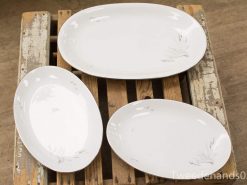 Elegant set of three oval porcelain serving dishes for stylish dining and entertaining.