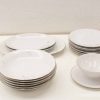 Timeless white ceramic dishware set, perfect for elegant dining and versatile meal presentations.