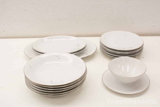 Timeless white ceramic dishware set, perfect for elegant dining and versatile meal presentations.