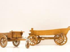 Miniature wooden carts showcasing craftsmanship and vintage charm for decor or collectibles.