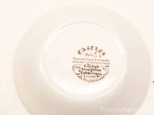 Elegant hand-engraved ceramic bowl from England, combining style and durability for collectors.
