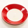 Vintage dinner plates with vibrant red rims, perfect for stylish dining occasions. Set of 4.
