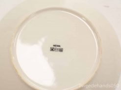 Glossy vintage HEMA ceramic plate, stylish and practical for casual or formal dining.