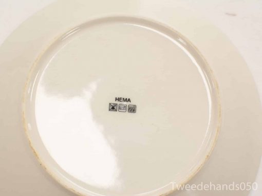 Glossy vintage HEMA ceramic plate, stylish and practical for casual or formal dining.